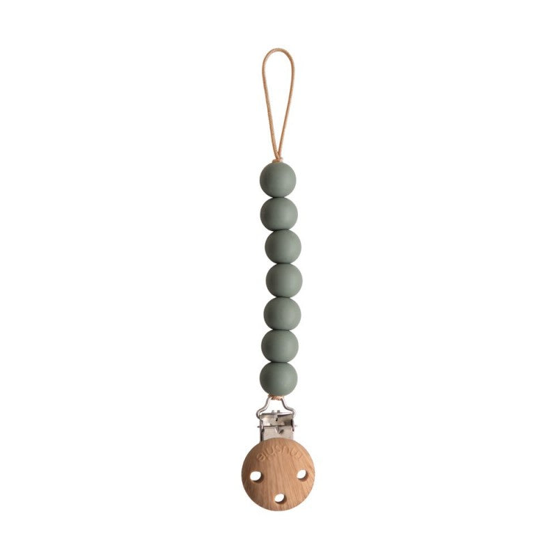 prendedor de chupetas em silicone da gama halo na cor dried thyme da marca mushie