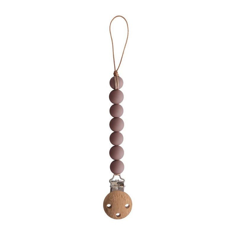prendedor de chupetas em silicone da gama halo na cor cloudy mauve da marca mushie