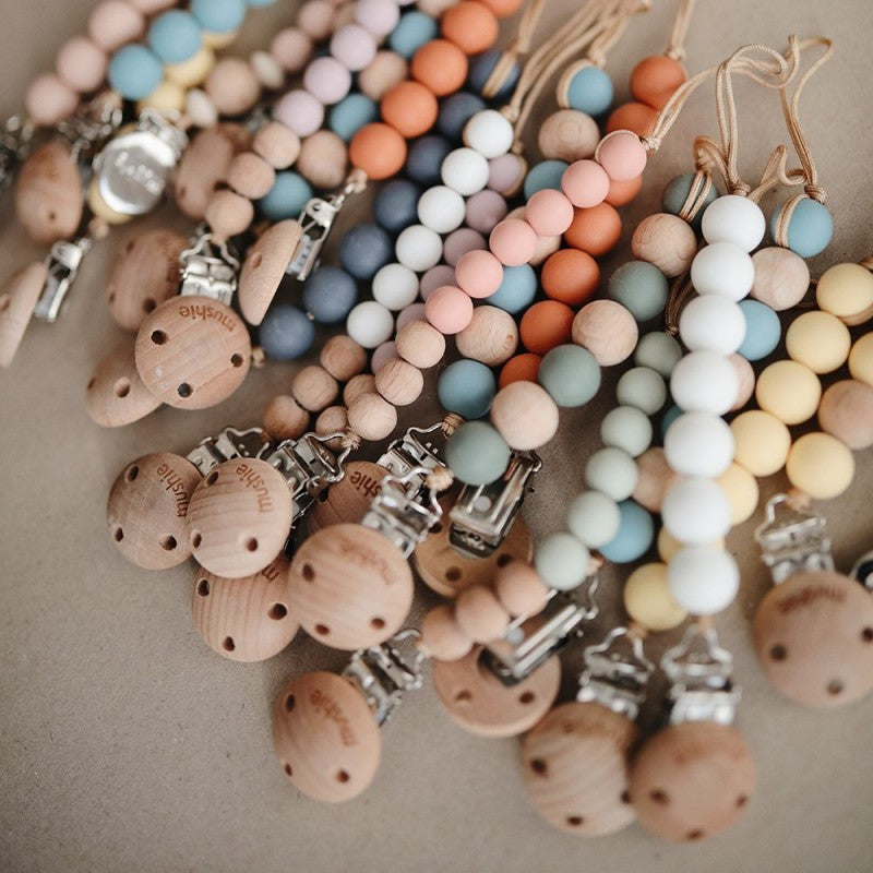 Prendedor de Chupeta Halo Pale Taupe | Mushie