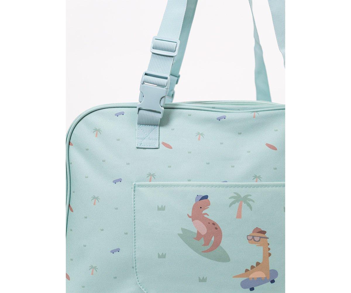 bolsa de praia anti-areia da marca Monneka no padrão Cool Dinos em detalhe