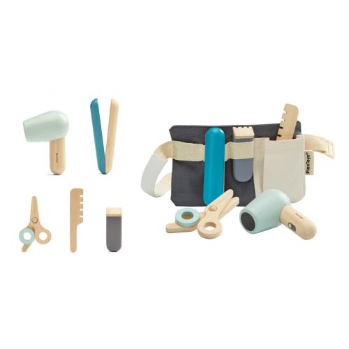 Brinquedo de madeira com conjunto de cabeleireiro e acessórios da marca Plan Toys