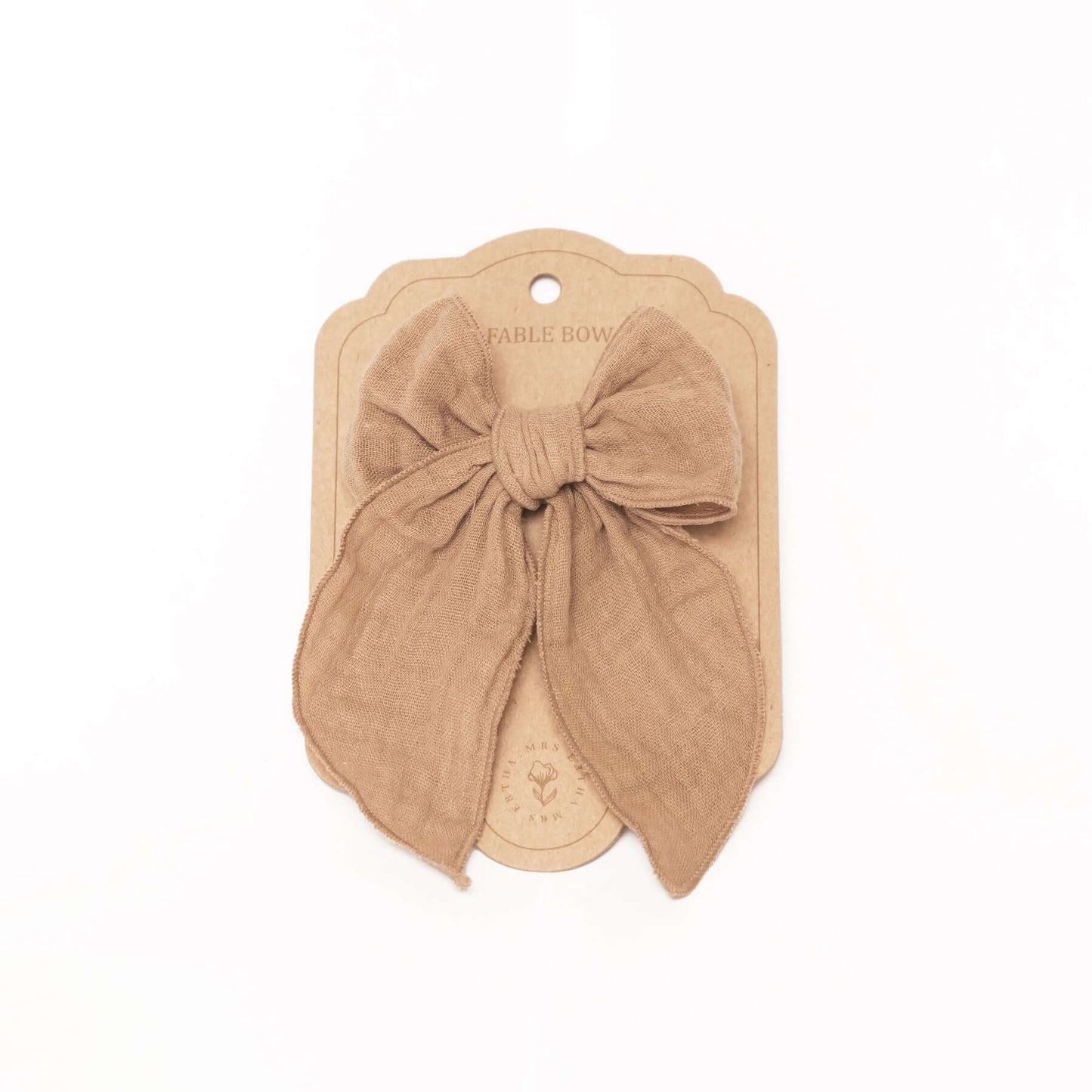 Gancho para cabelo de bebés e crianças em forma de laço da cor Taupe da marca Mrs Ertha